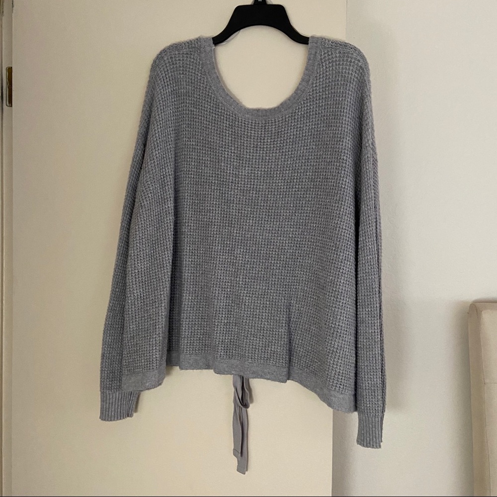 1. State Tie Up Sweater